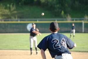 Evan McClain getting runner out at first