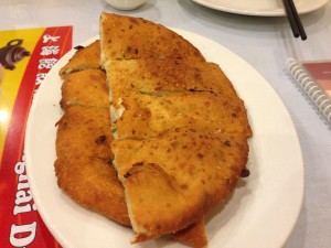 The green onion pancake was crunchy on the outside and chewy on the inside.