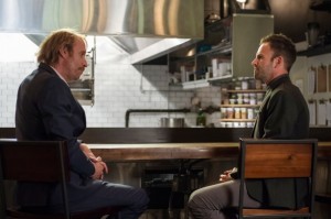 Sherlock (Jonny Lee Miller, right) agrees to help solve a case involving the former fiancée of Mycroft Holmes (Rhys Ifans, left).