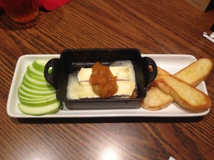 The Artisan Baked Brie was a unique French appetizer that tasted fairly good.