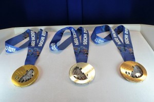 From left to right, the gold, silver, and bronze 2014 Olympic medals.