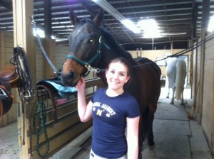 Senior Lauren Livengood with her horse Eustace. 